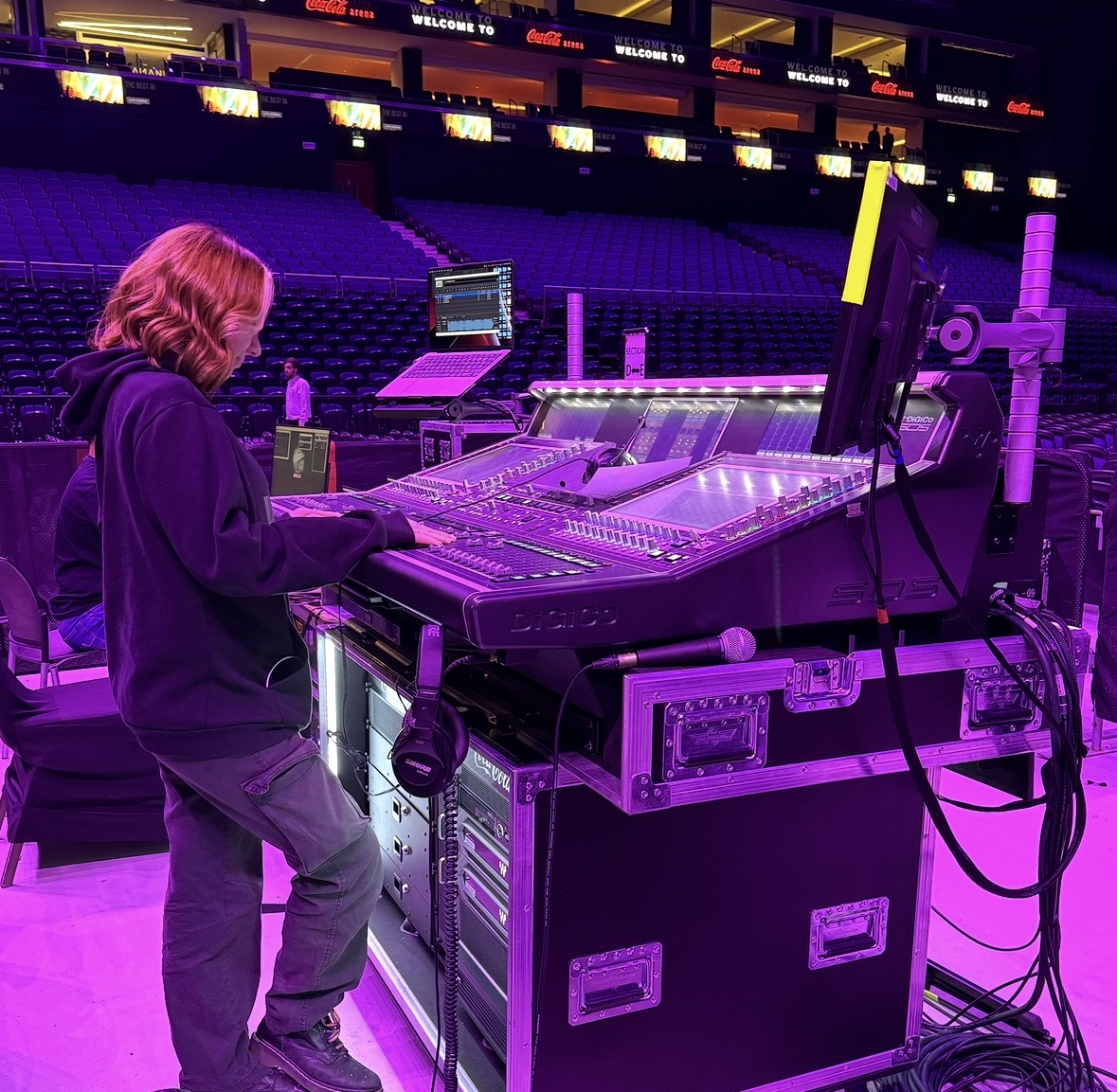 Lottie Victoria working at a live sound desk